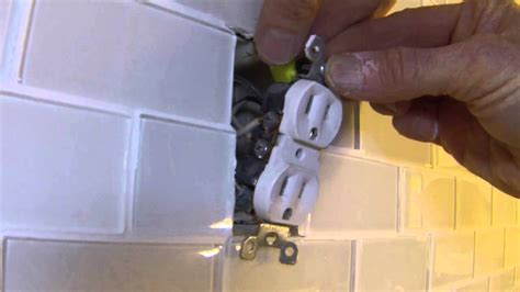 did not trim tile to edge of electrica box|how to tile electrical box.